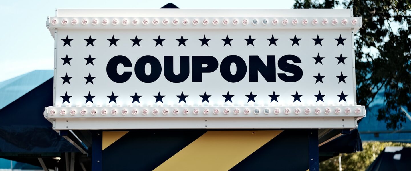 a sign that says coupons